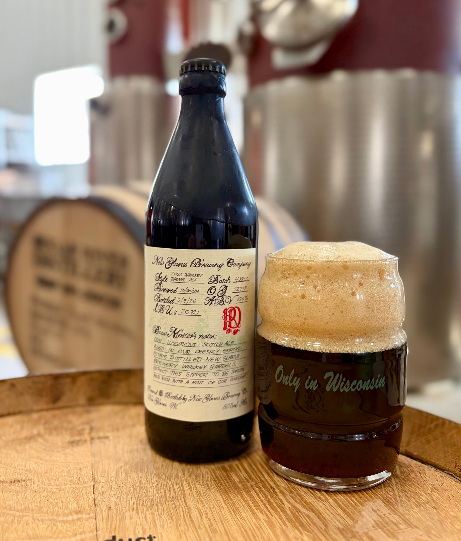 Whiskey Barrel Ale Photo with still and barrel background.
