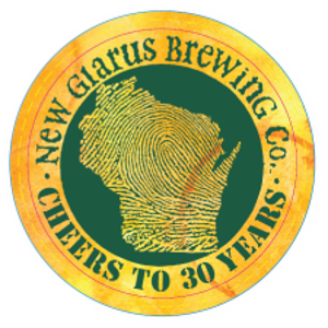 Yellow circular cardboard coaster featuring New Glarus Brewing Co.'s "Cheers to 30 Years" in green.