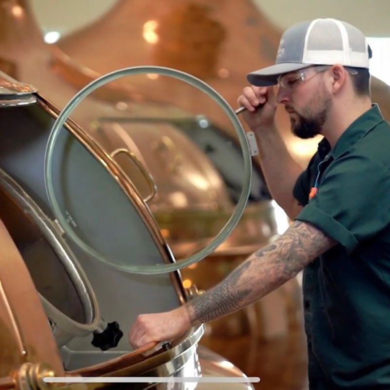 Brewer looking into copper kettle