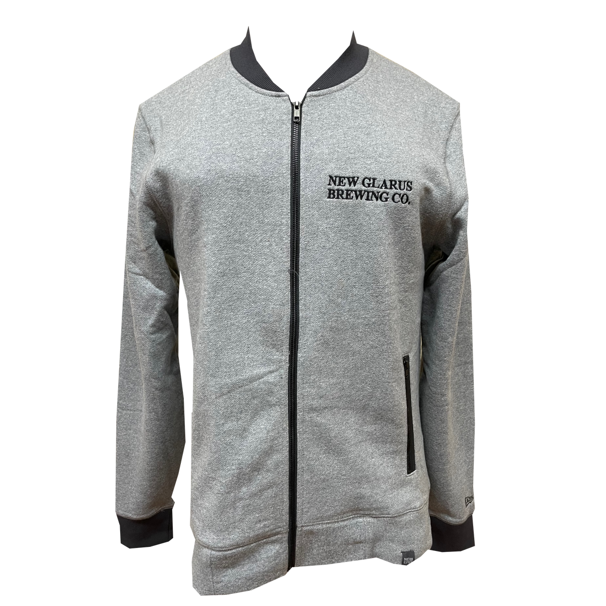 Light gray full zip jacket with darker gray knit cuffs, collar and waist band. Features New Glarus Brewing Co. embroidered in black on the front left chest.