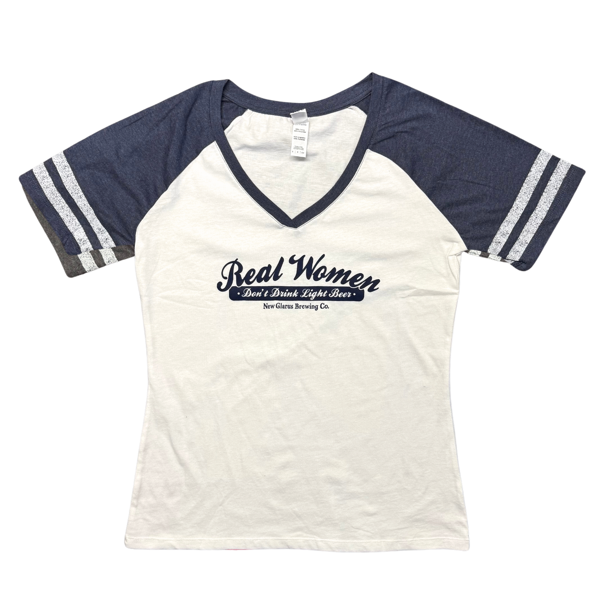 District ladies V-neck baseball tee, white with navy blue sleeves. With New Glarus Brewing Co.&#39;s Real Women logo on front in navy blue.