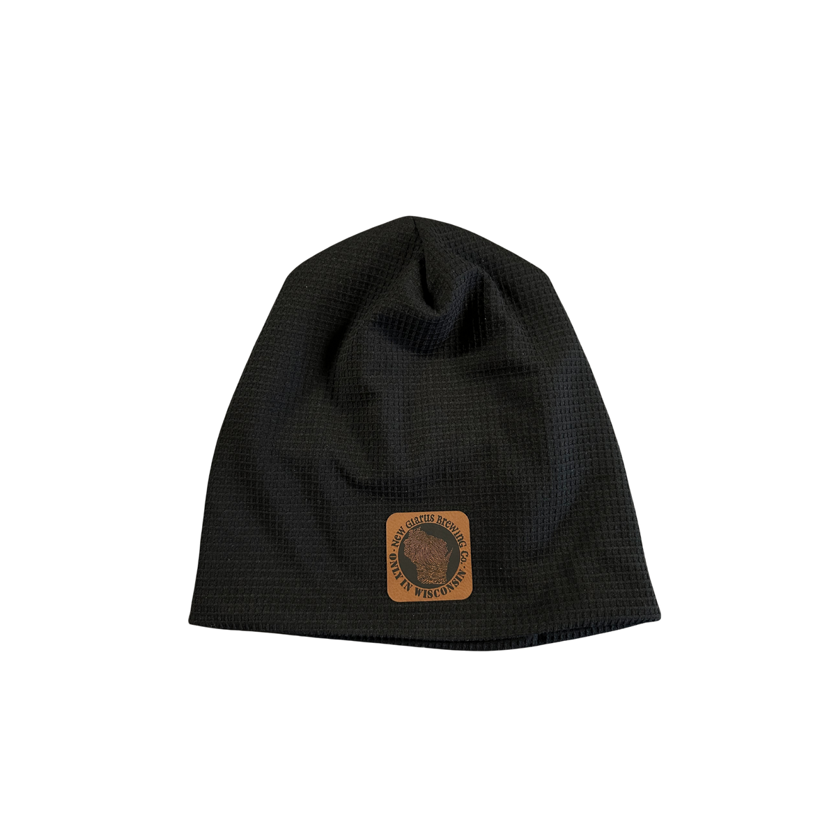 Black colored waffled beanie with a square brown leather patch with New Glarus Brewing Co and Only in Wisconsin thumbprint logo. 