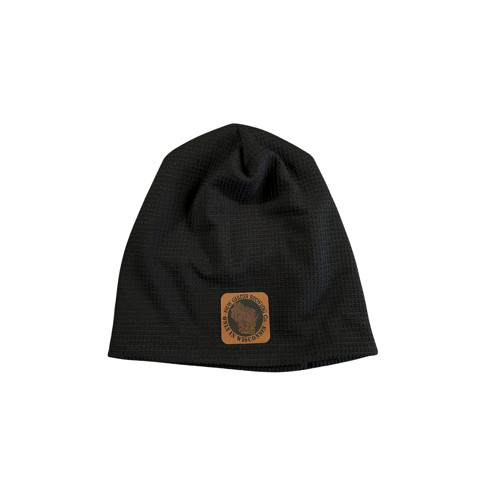 Black colored waffled beanie with a square brown leather patch with New Glarus Brewing Co and Only in Wisconsin thumbprint logo. 