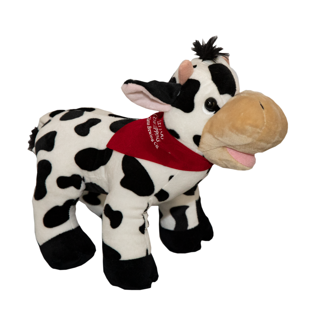 Plush stuffed black and white spotted cow toy with a red bandana.