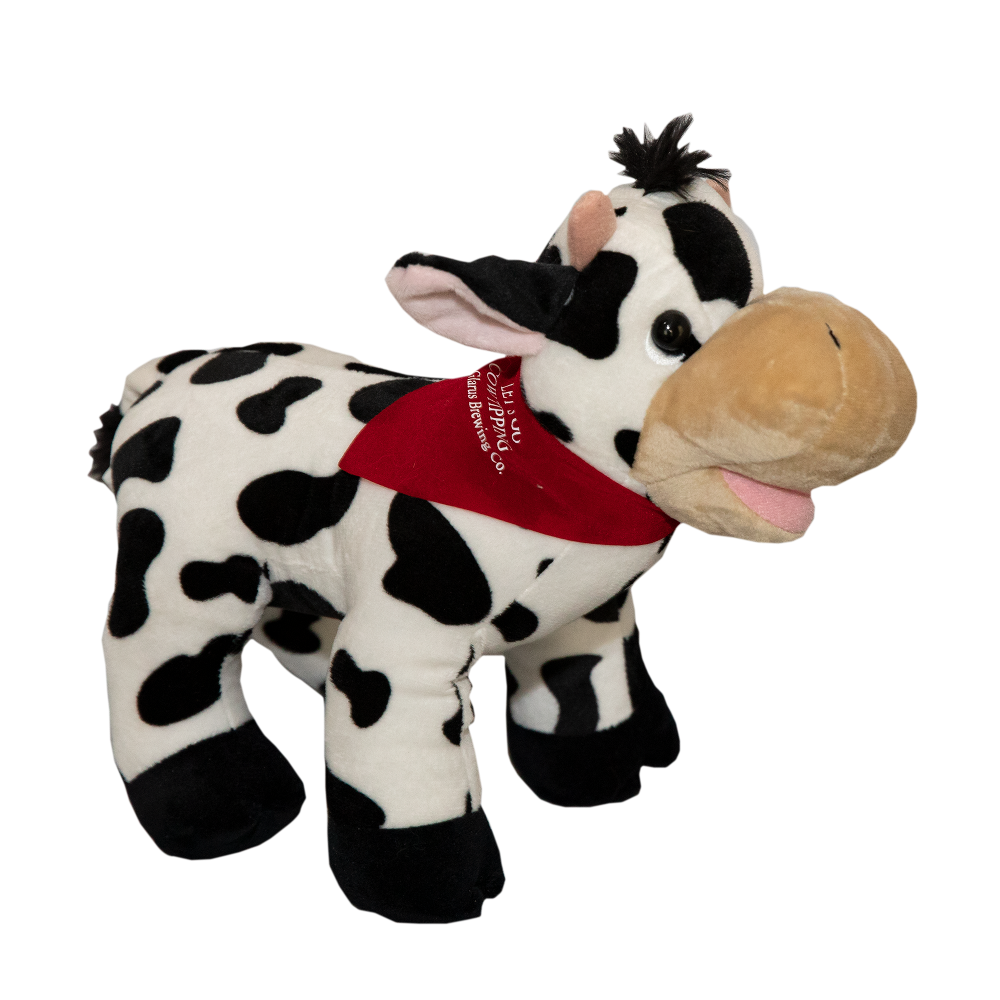 Plush stuffed black and white spotted cow toy with a red bandana.