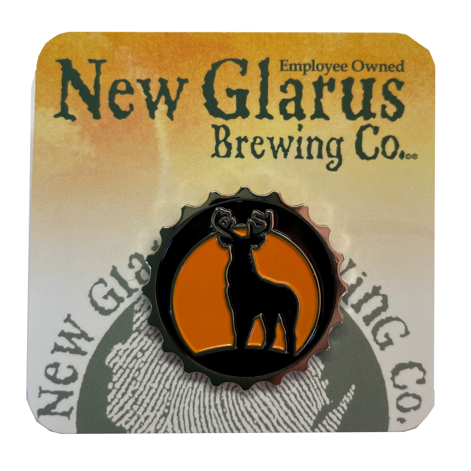 Bottle cap shaped circle black enamel pin with orange background, and a black staghorn.