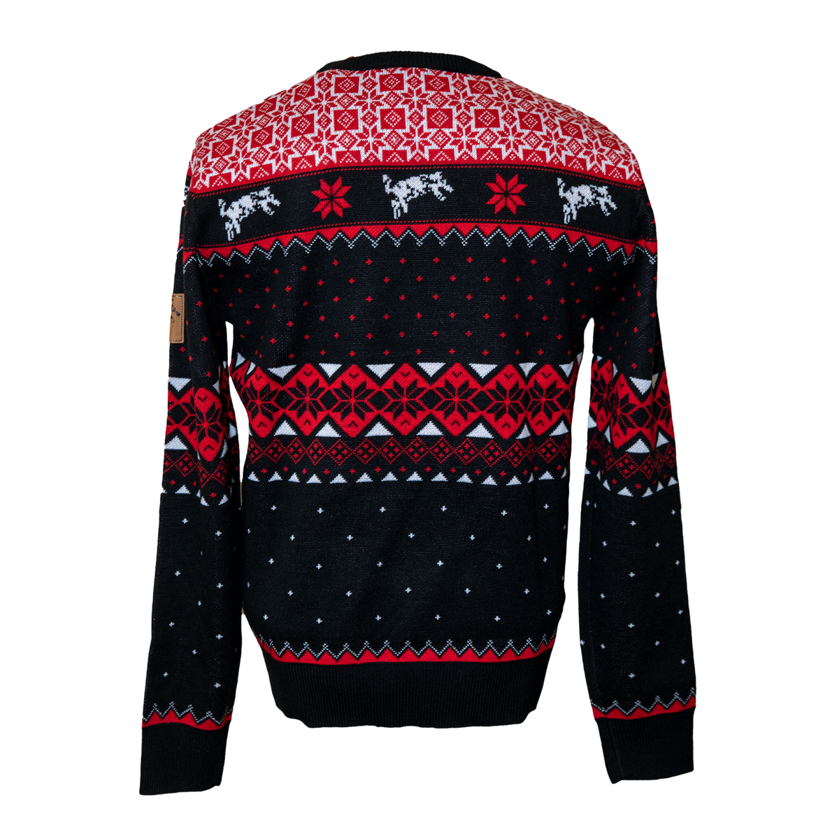 Black, red and white holiday sweater with small spotted cows across the back.